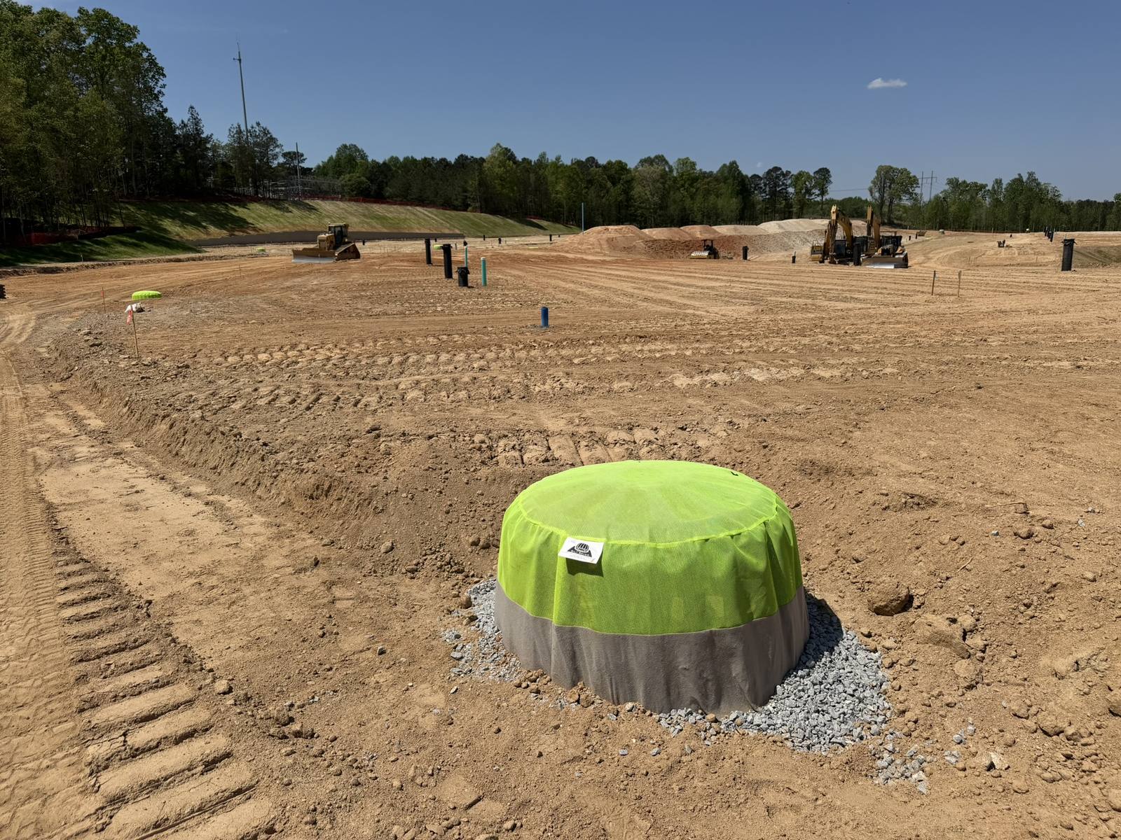 Silt Saver frame and filter assembly installed on a graded construction pad